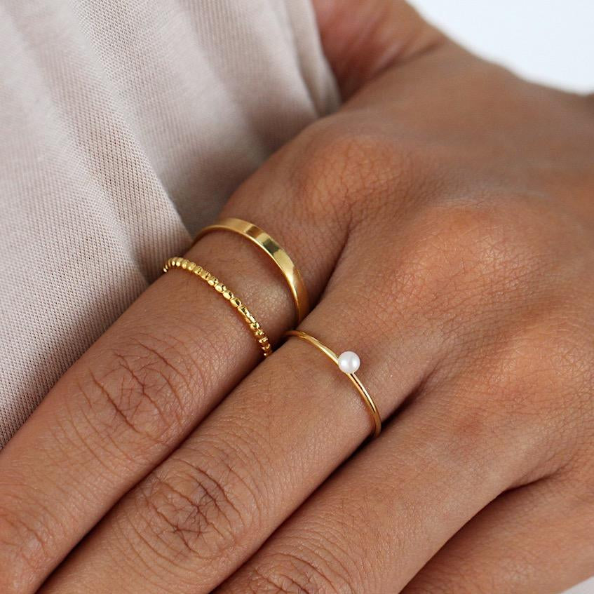 Pearl with gold ring online