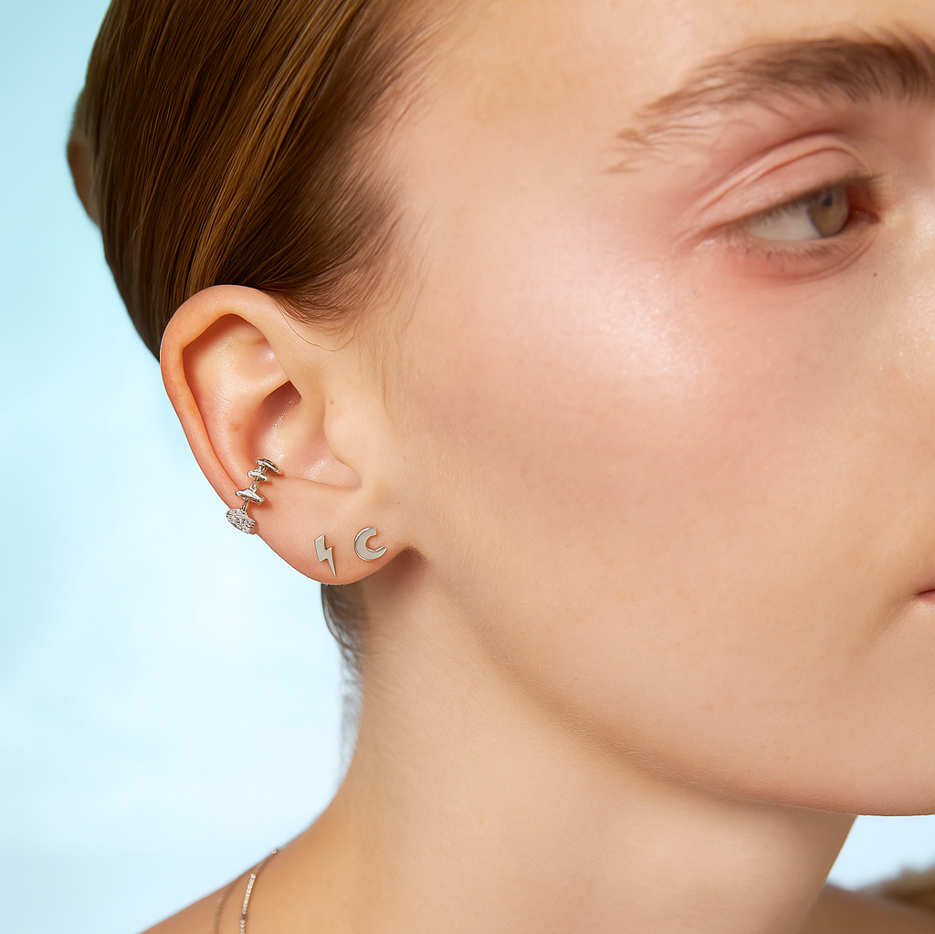 Boucle d'oreille à plat en forme de croissant de lune