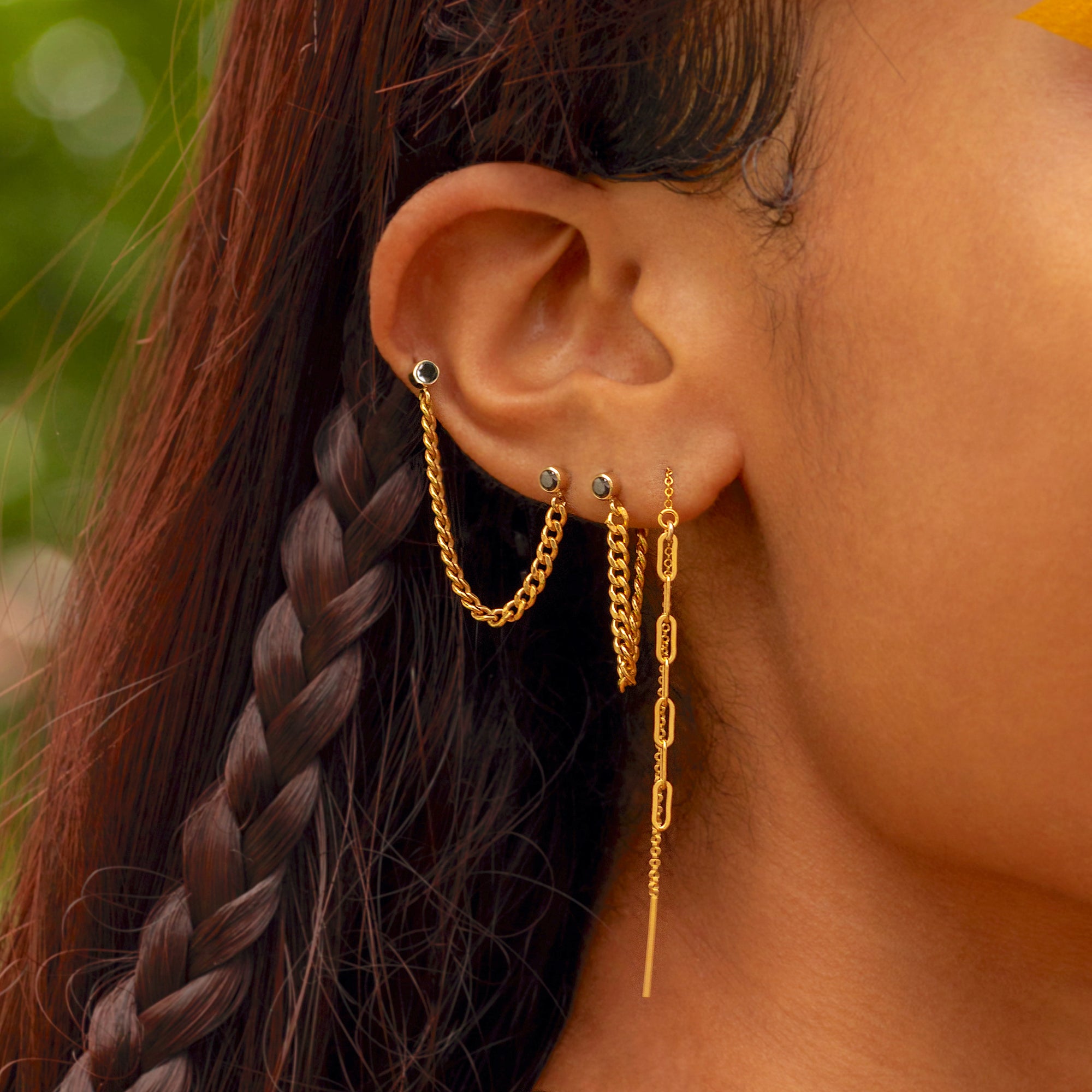 Oorbellen met zwarte rand en ketting