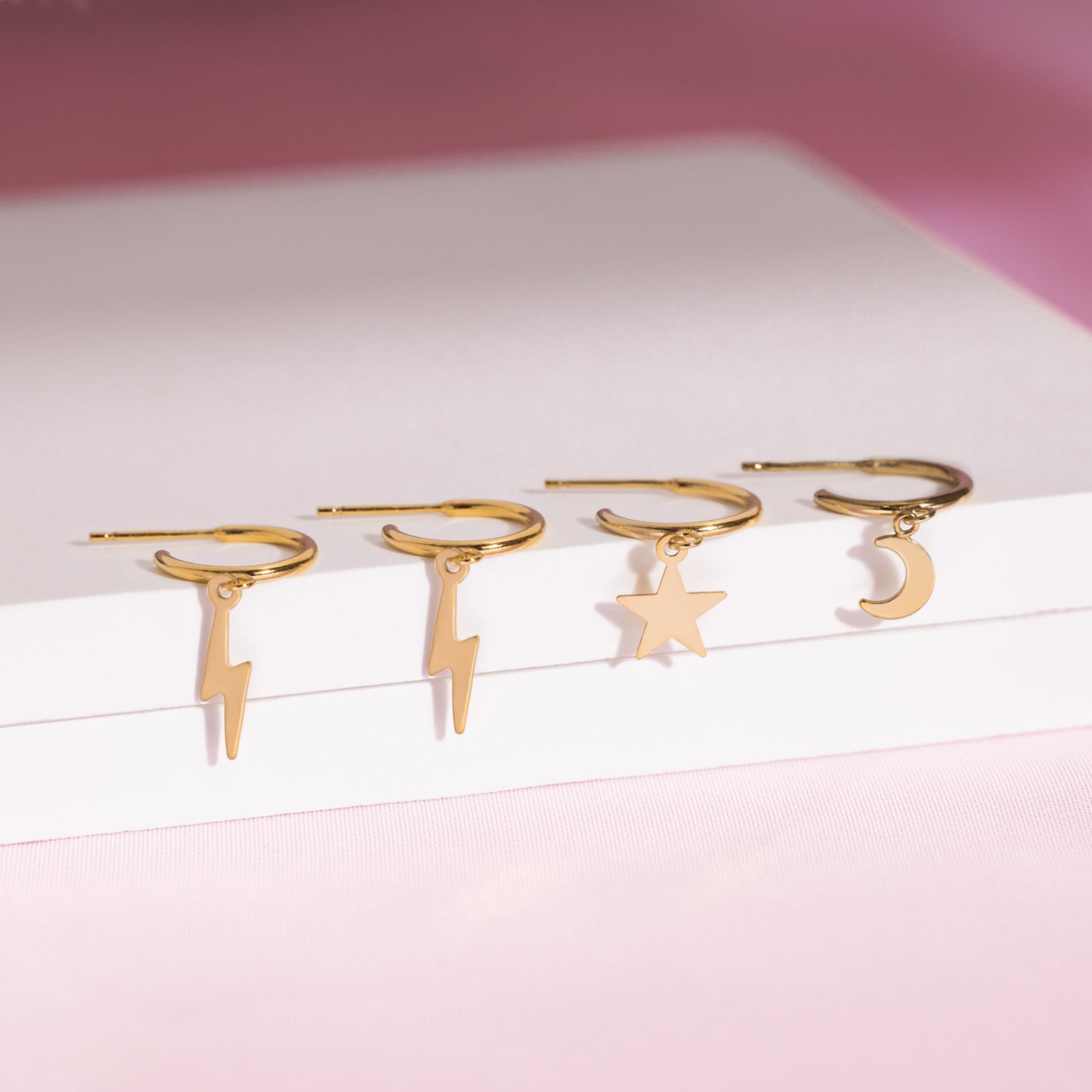 Pendientes de aro con rayo de luz