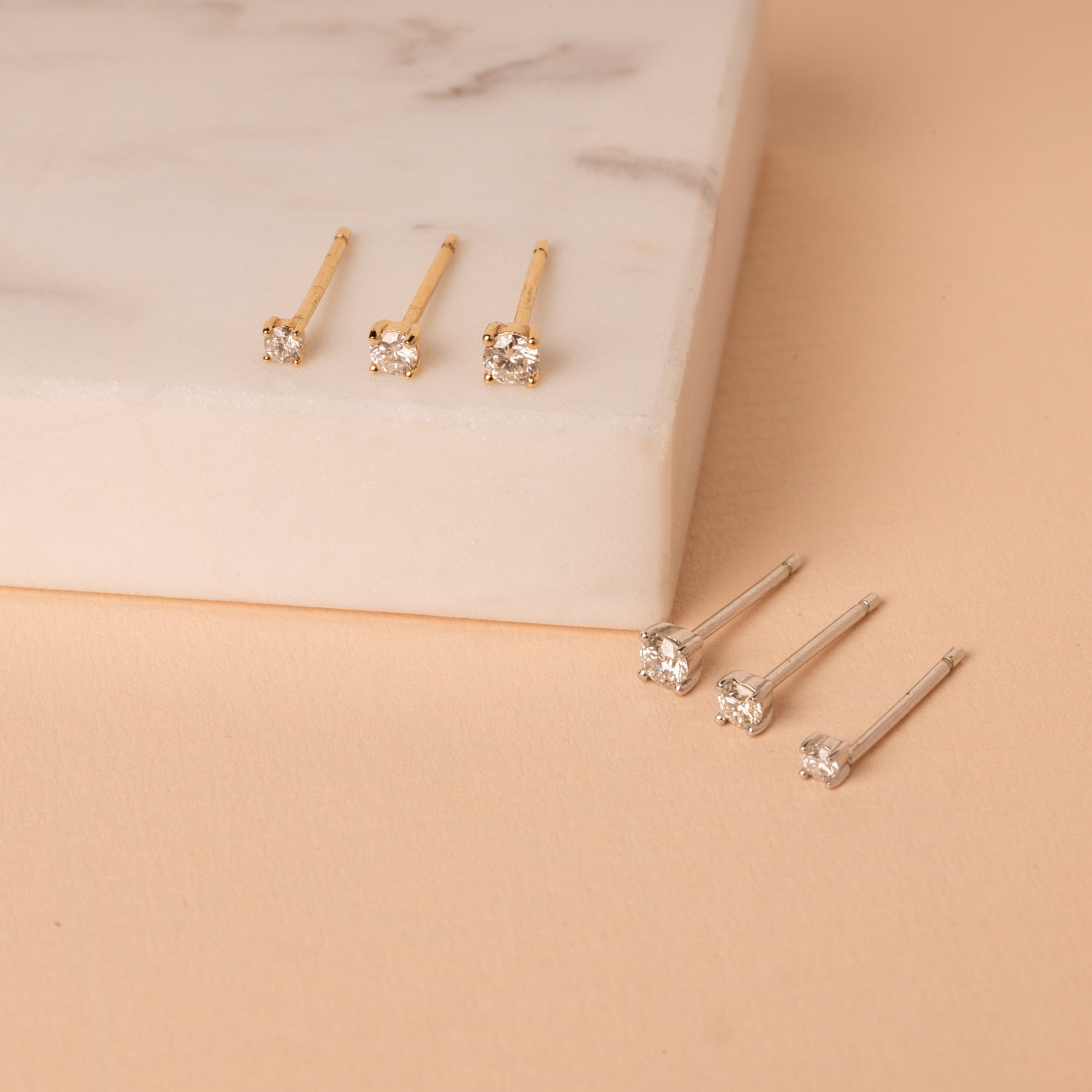 Tiny Diamond Studs 14K Yellow Gold / Pair by Baby Gold - Shop Custom Gold Jewelry