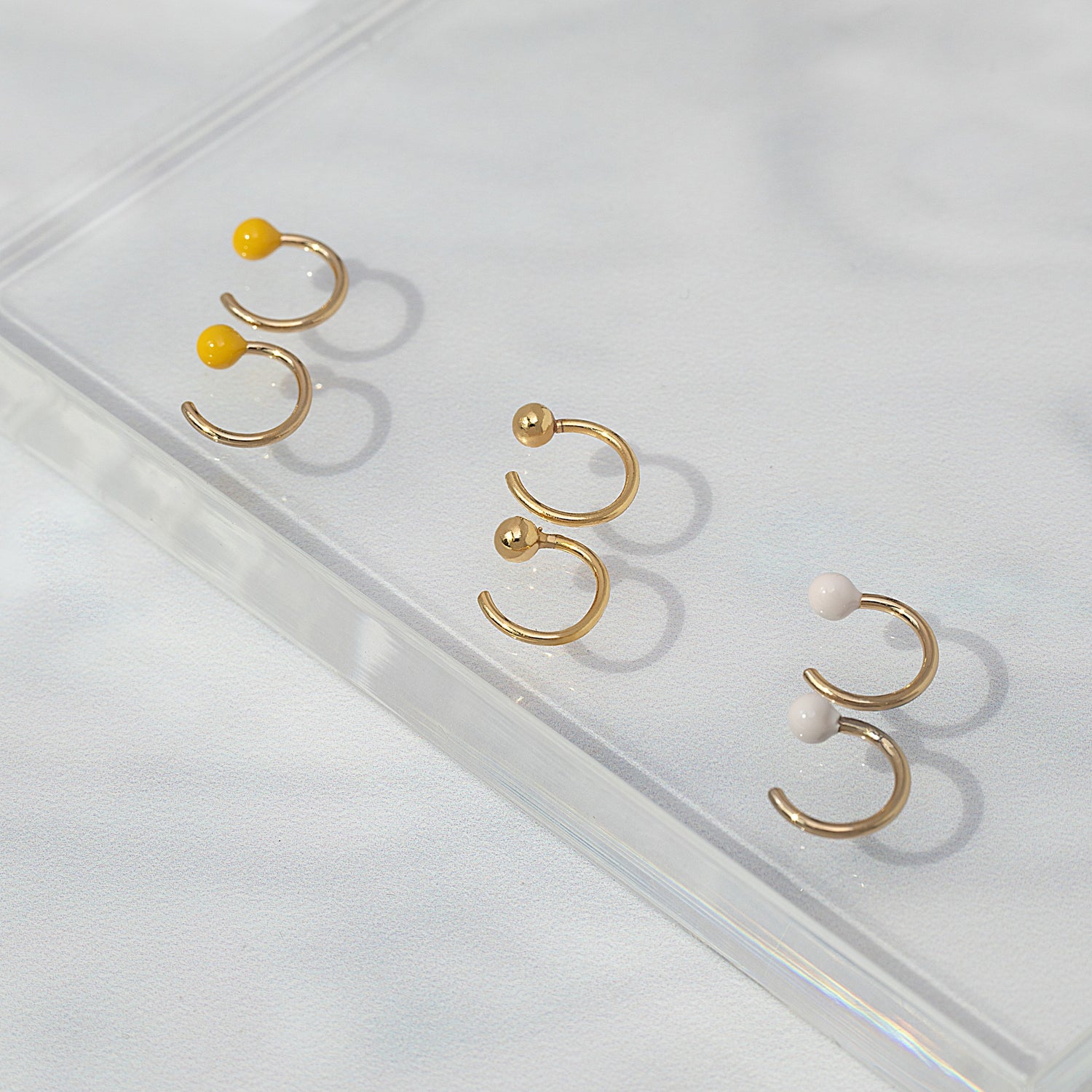 Anting Huggie Bola Bayi Merah Muda