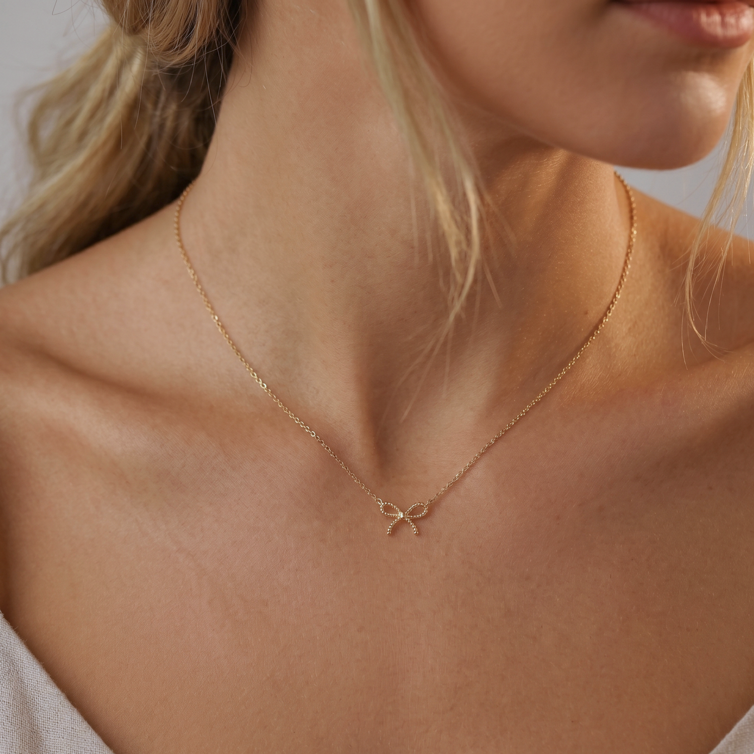 14K Solid Gold Micro Bow Necklace