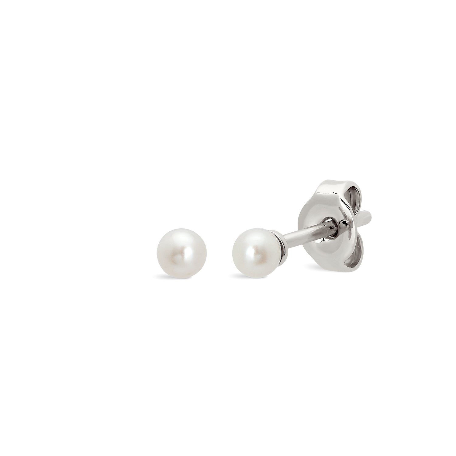 Vintage CHANEL white teardrop faux pearl dangle earrings with blue