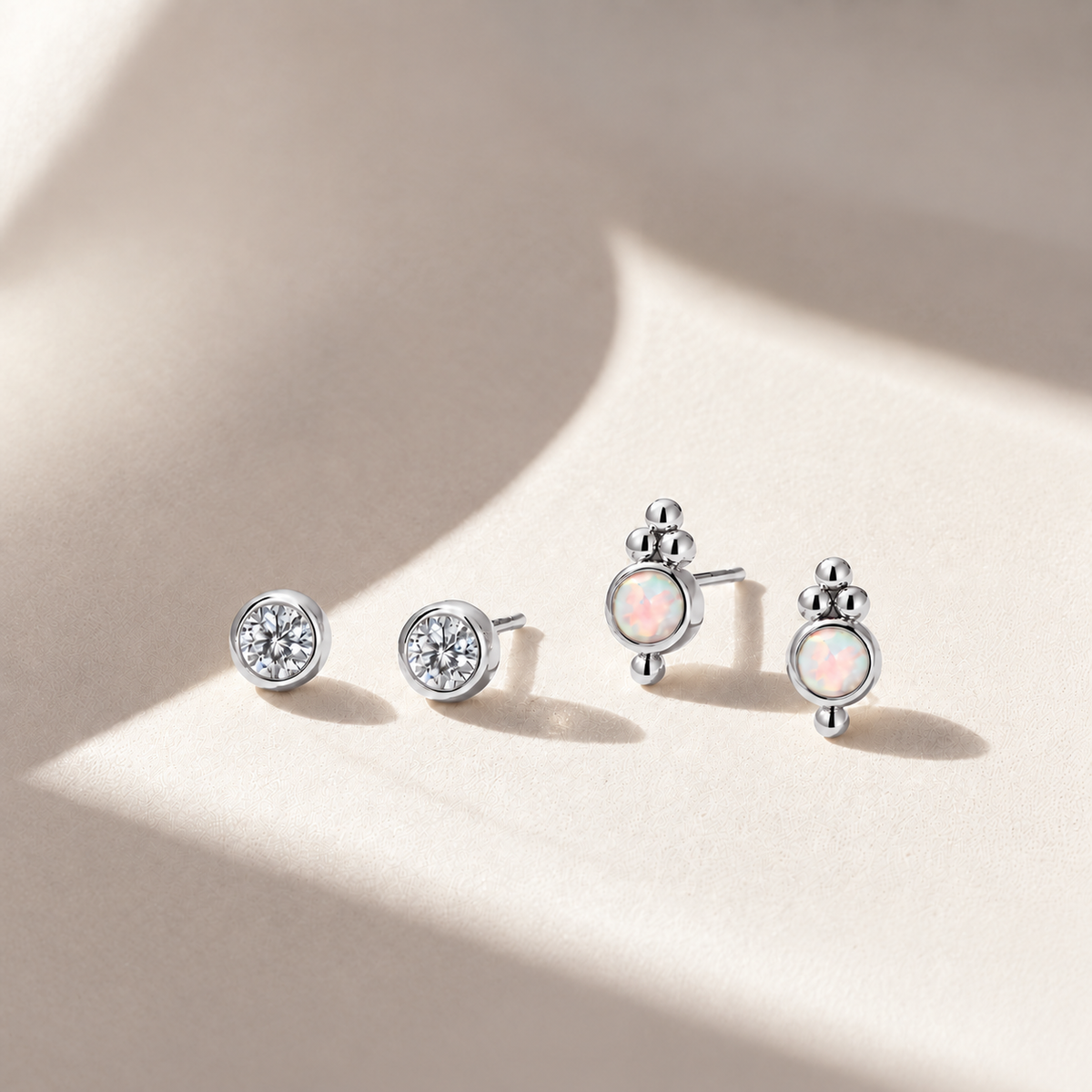 Four_polished_silver_opal_earrings
