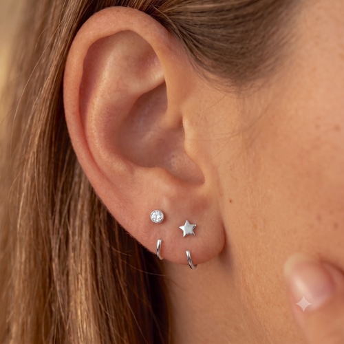 Pendientes de estrella Huggie