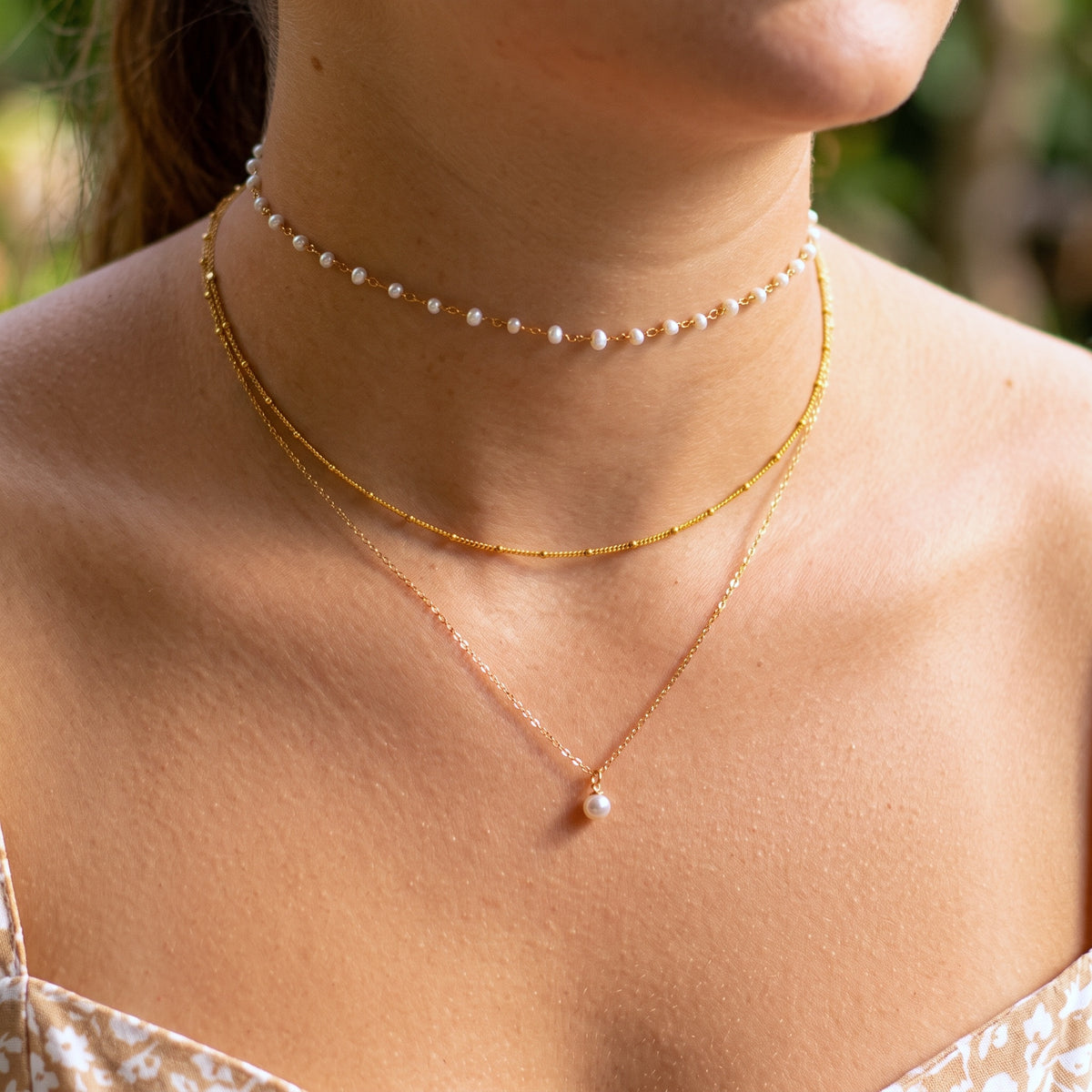 Collier de perles minimales