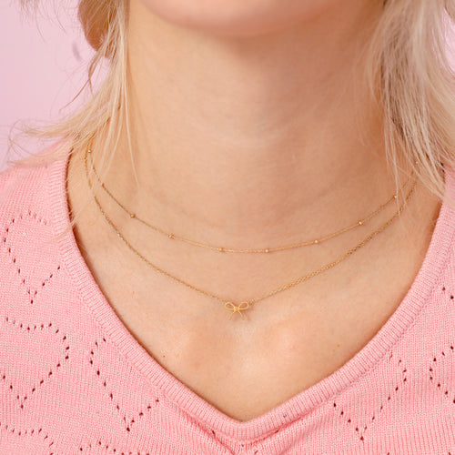 14K Solid Gold Micro Bow Necklace