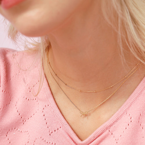 14K Solid Gold Micro Bow Necklace