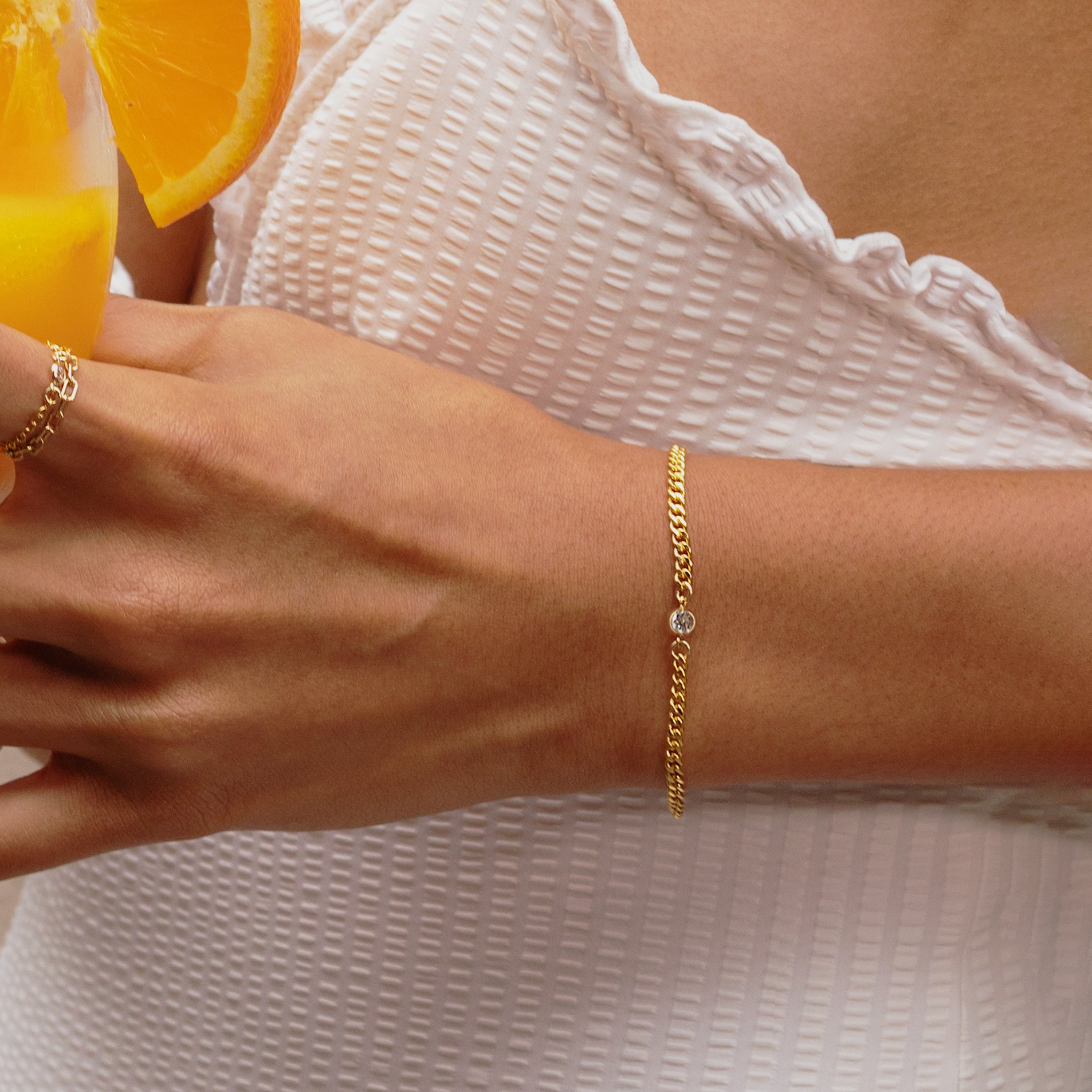 Bracciale con catena curb e castone