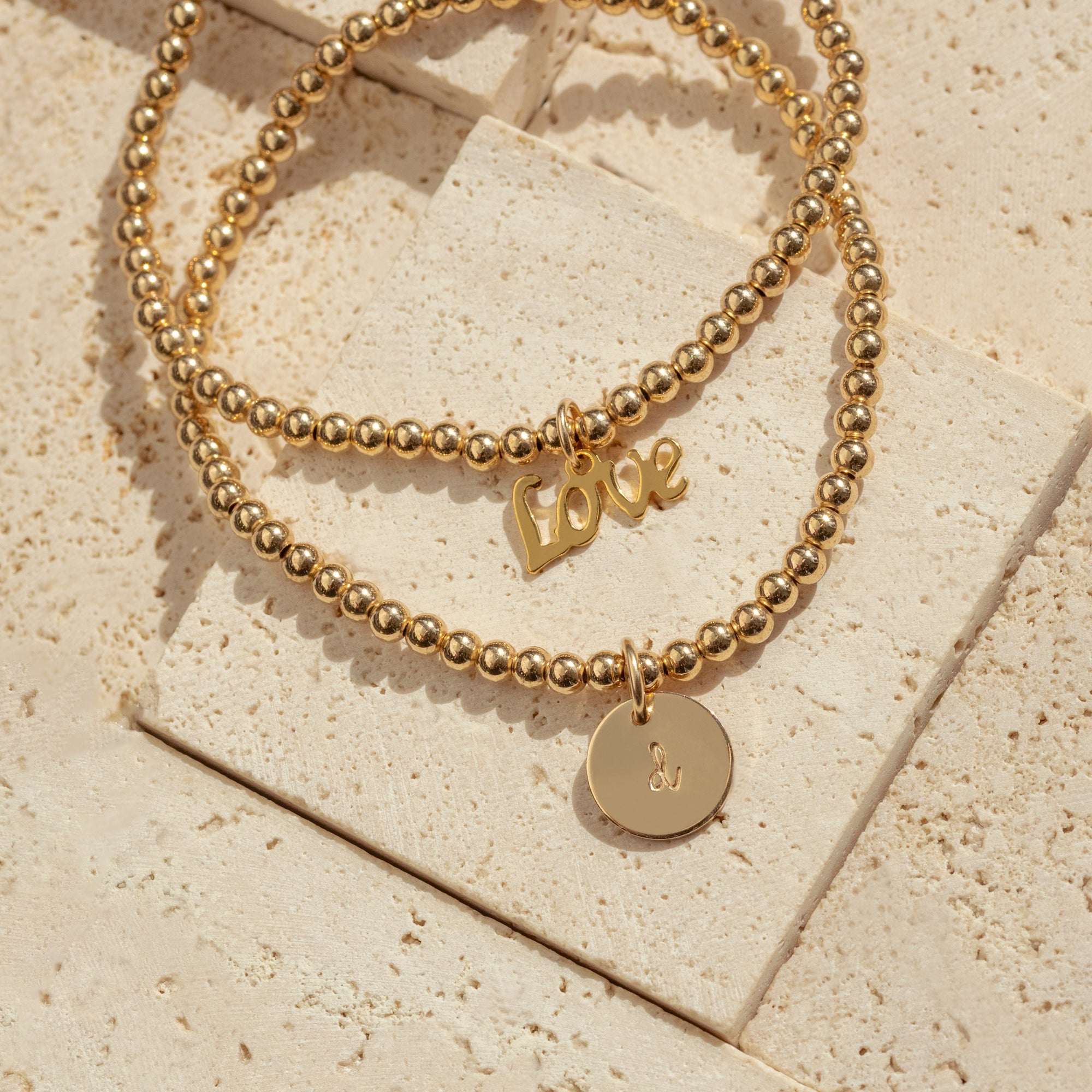 Personlig disk perlearmbånd gull