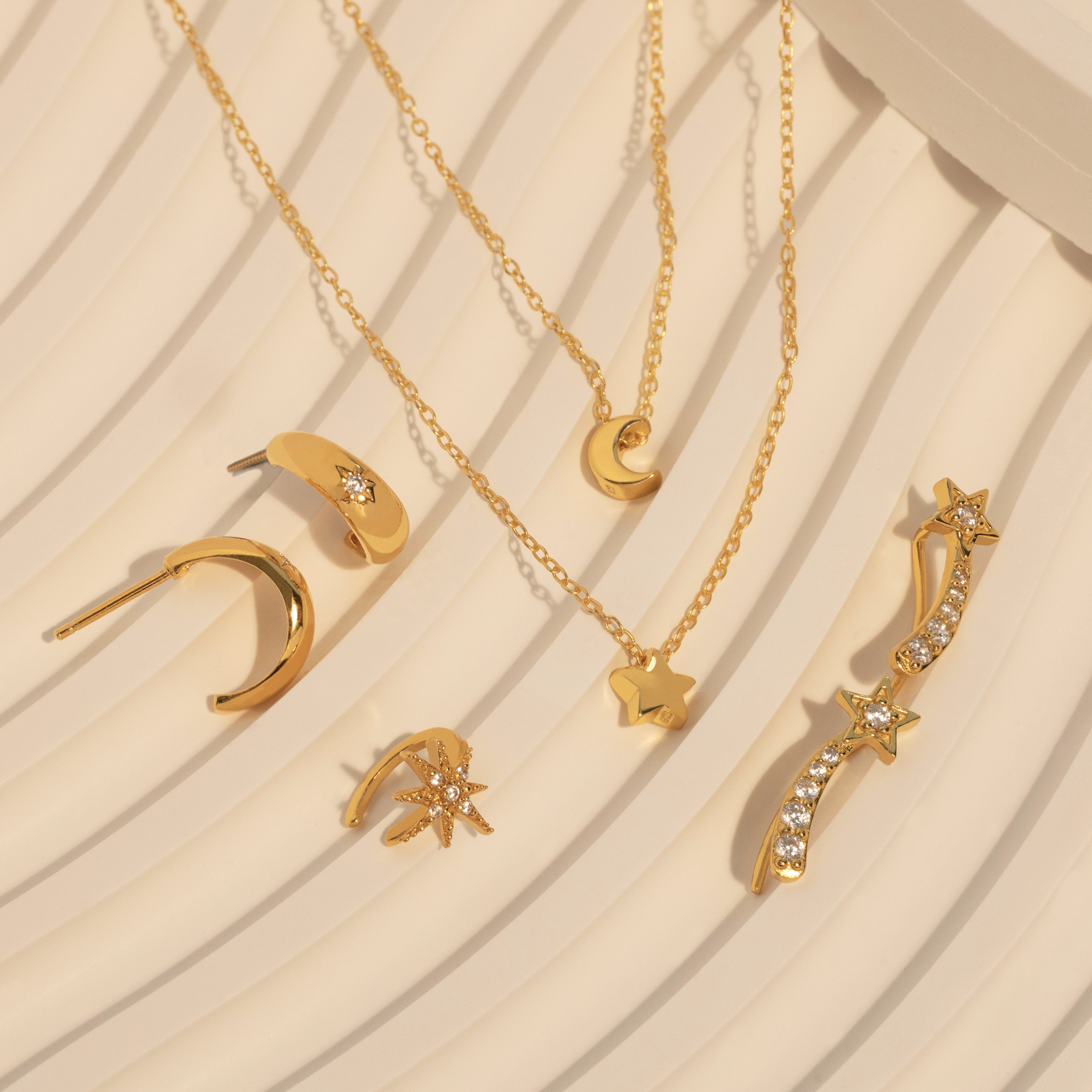 Gold necklace with little stars on sale
