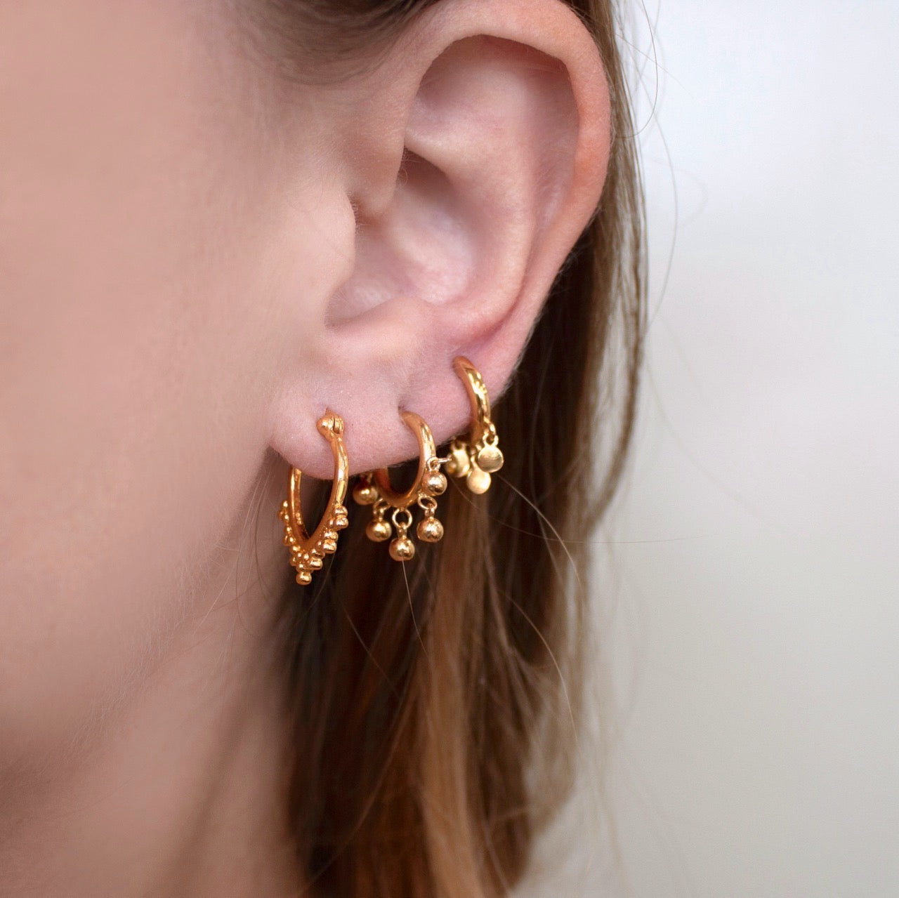 Shaker Disc Huggie Earrings