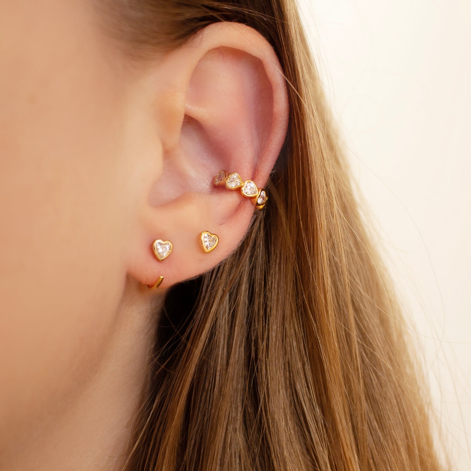 Mini gold online huggie earrings
