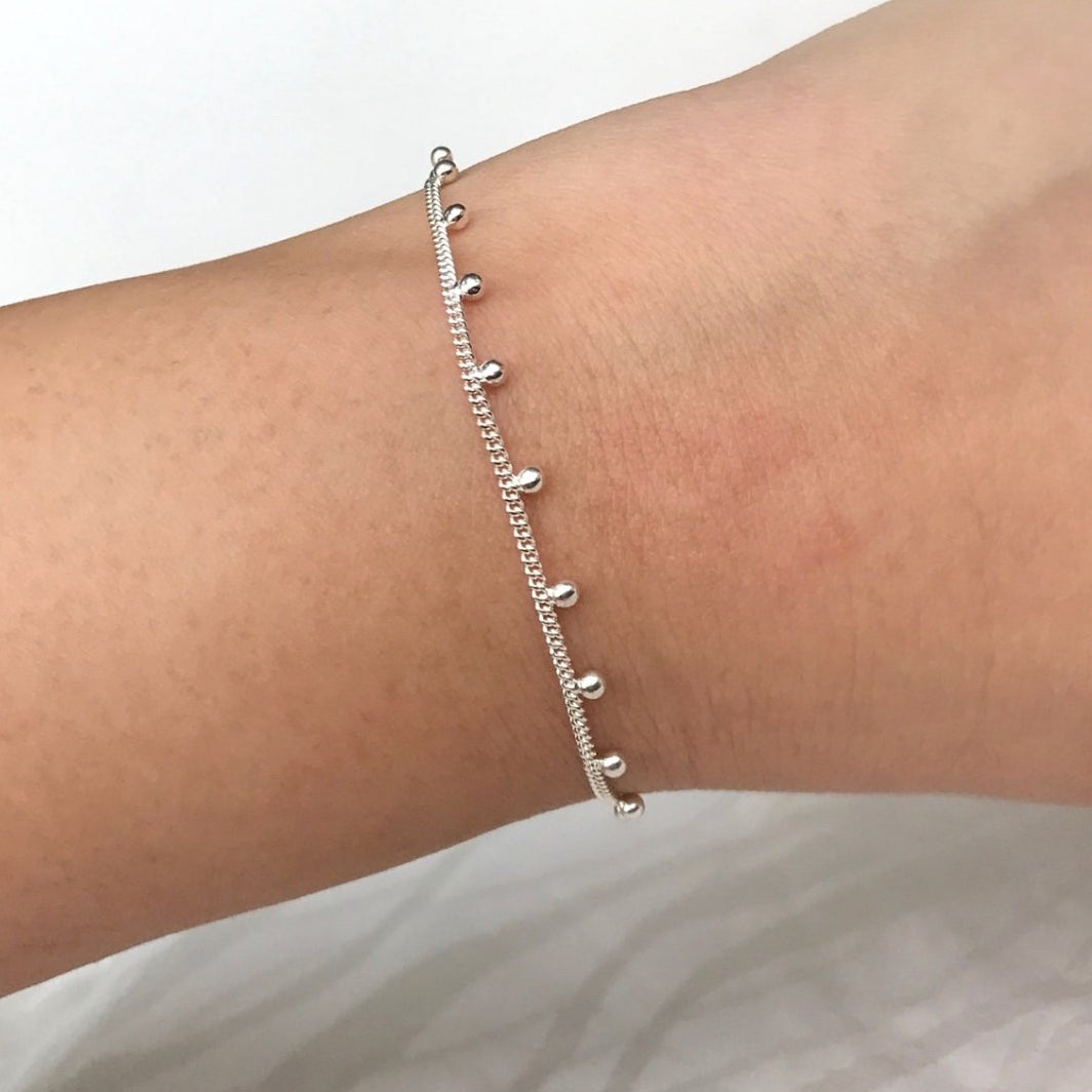 Braccialetto con pallina rimbalzante